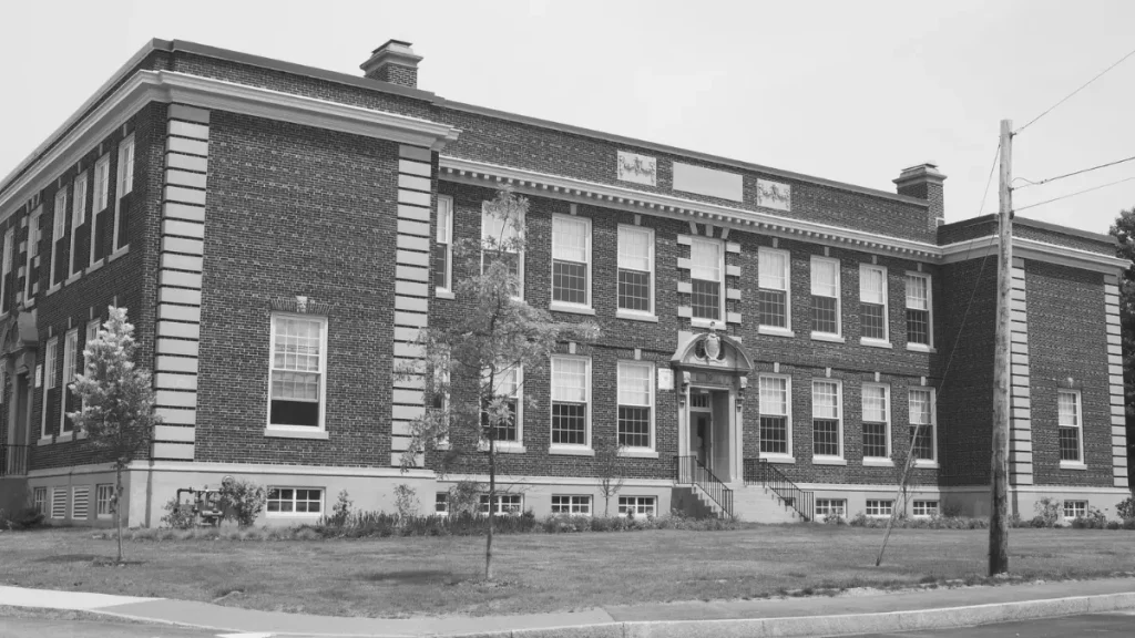 Exterior of a school building, representing the option of changing schools when a child is struggling in their current setting.
